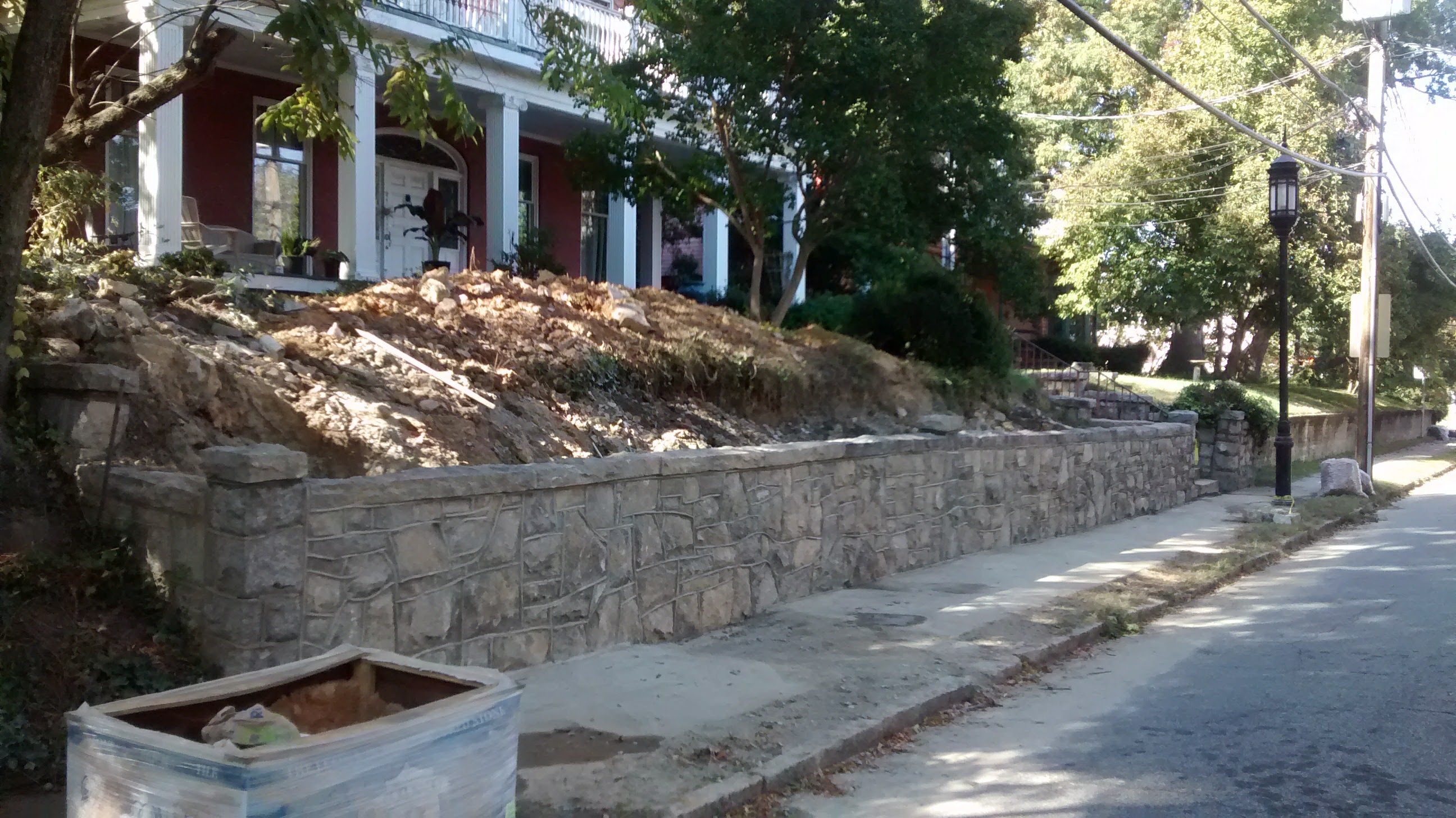 rebuilt wall at 110 south mendenhall, seen from the street