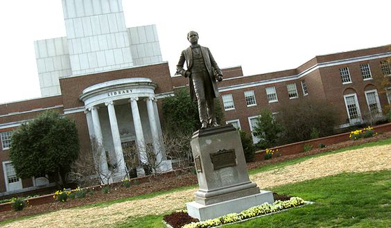photo of statue,m building and tower
