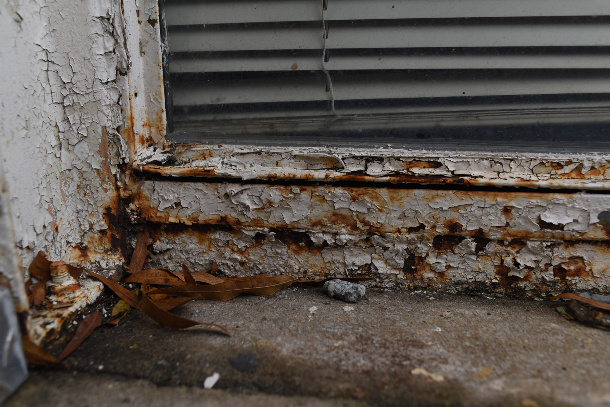 crumbling window frame at a guilford county school